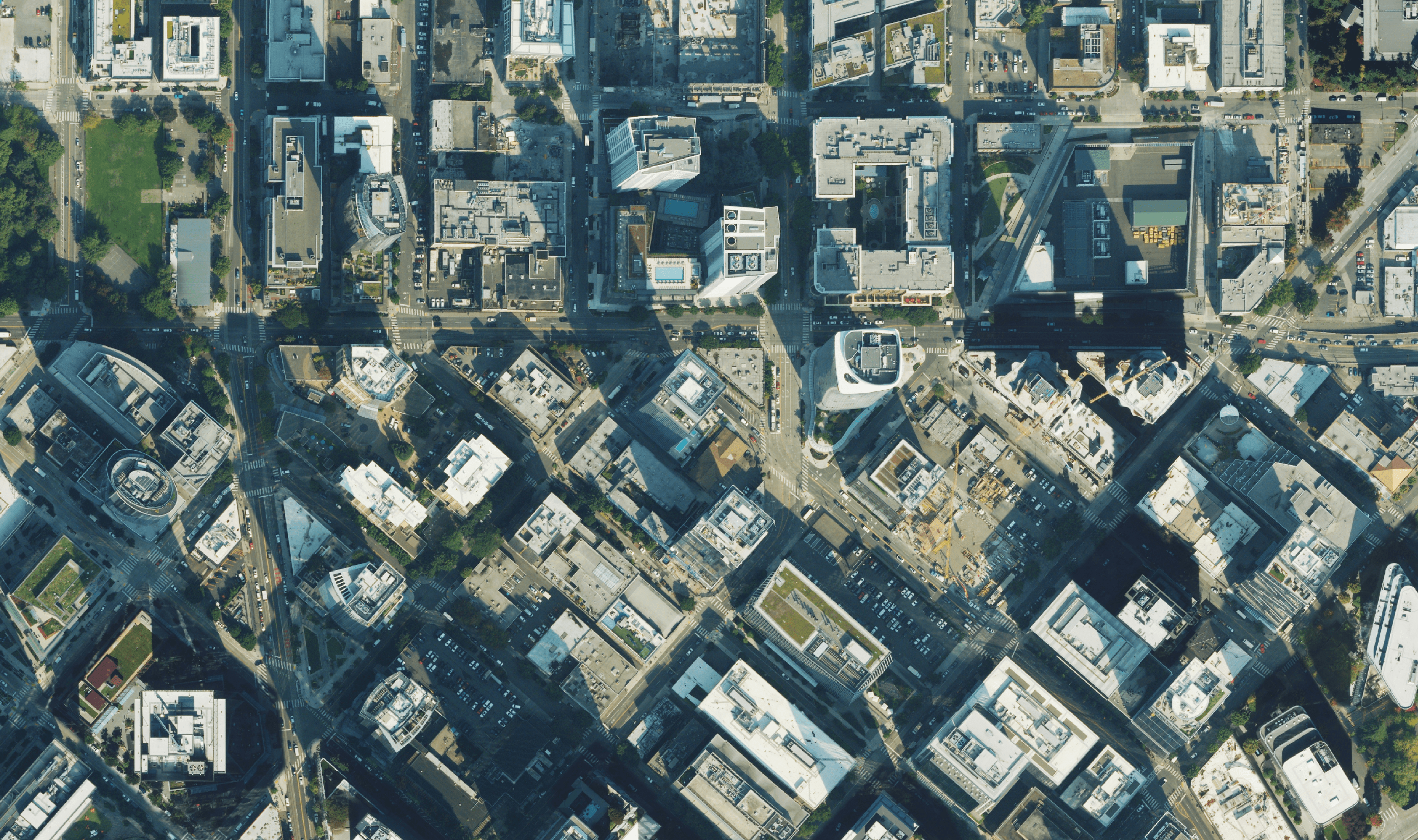 Aerial image showing the built environment of a city along with the overlay of pedestrain infrastructure